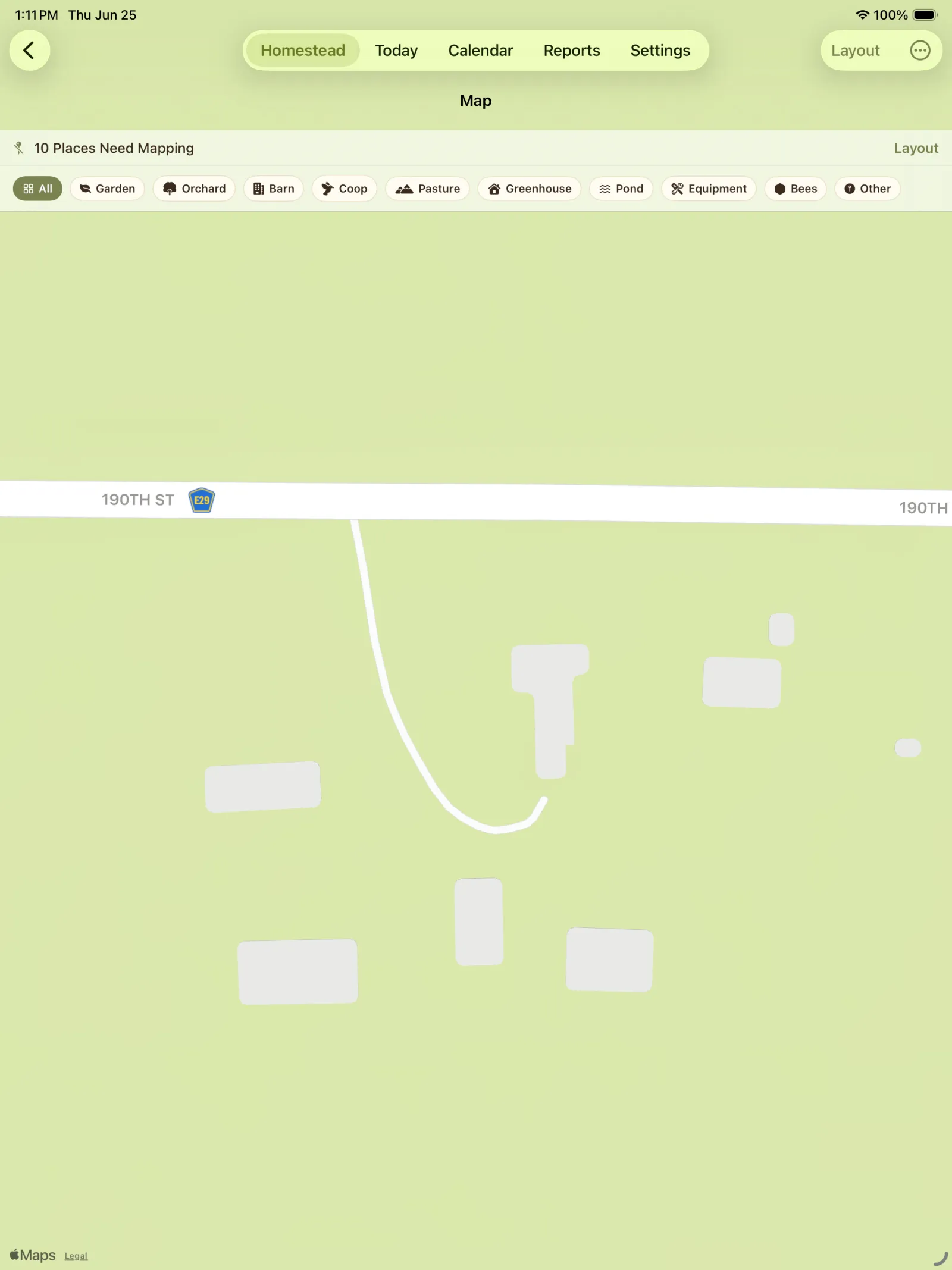 Map view showing a simple property map with roads and structures.